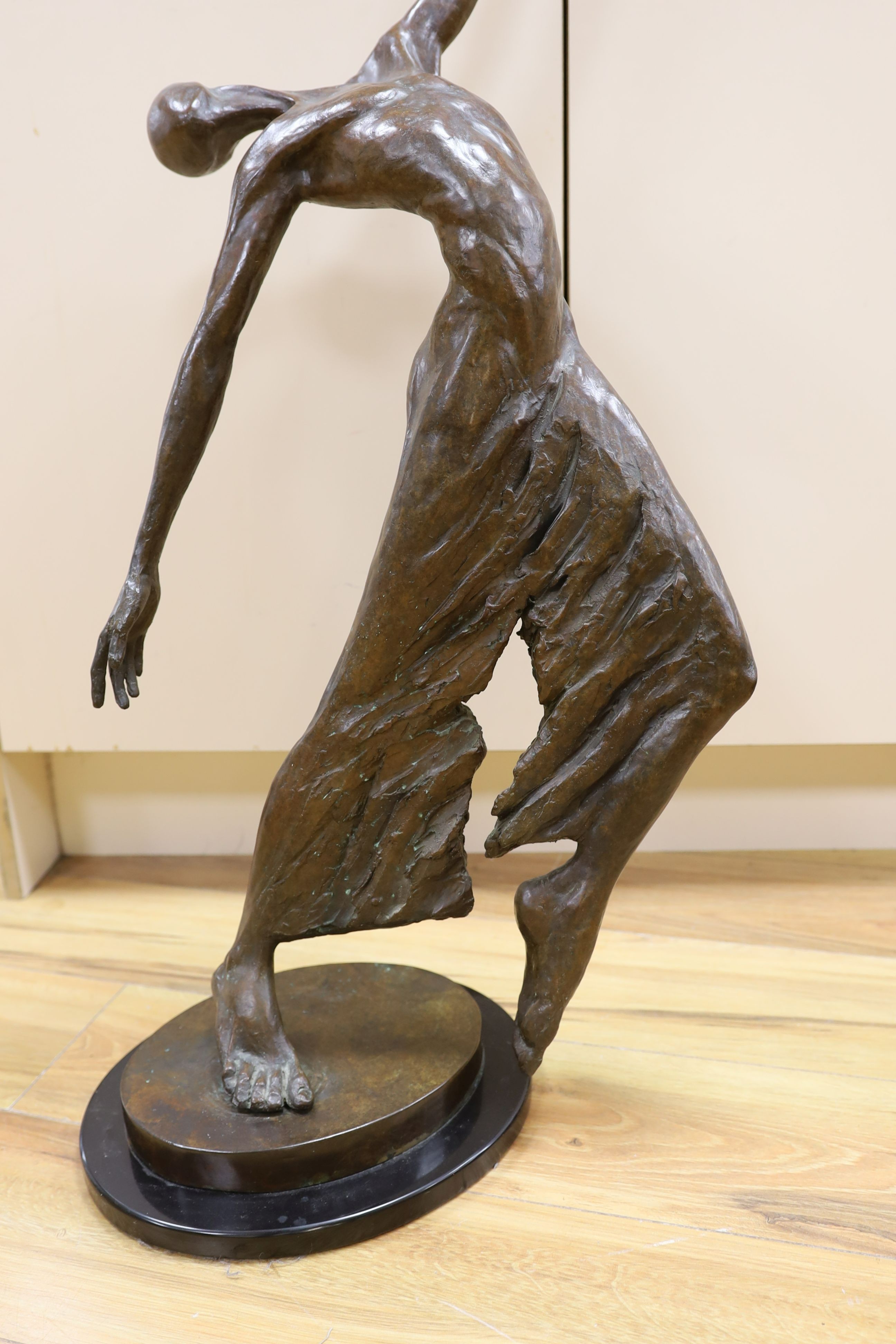 A large modern bronze of a male dancer, unsigned